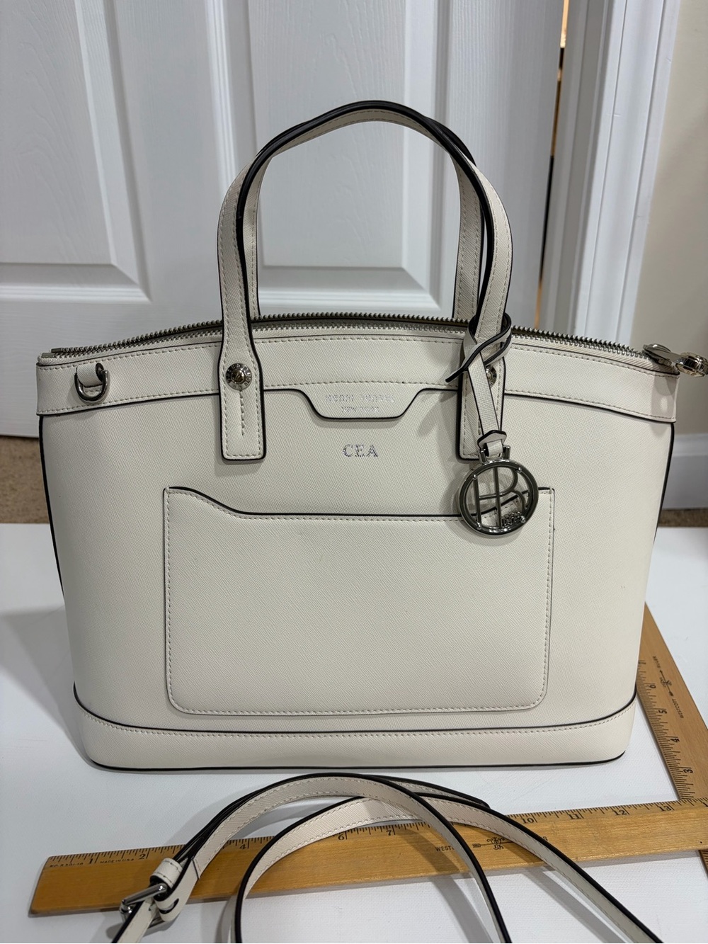 henri bendel Cream Saffiano Leather Satchel with Logo Charm